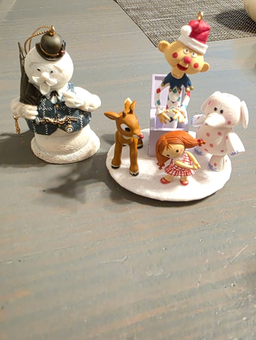 SET OF 2 RUDOLPH THEMED ORNAMENTS.